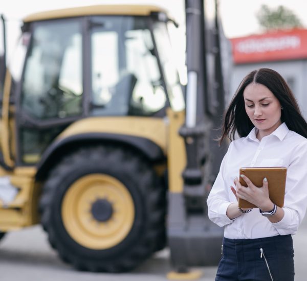 working-woman-with-orange-tablet-hands